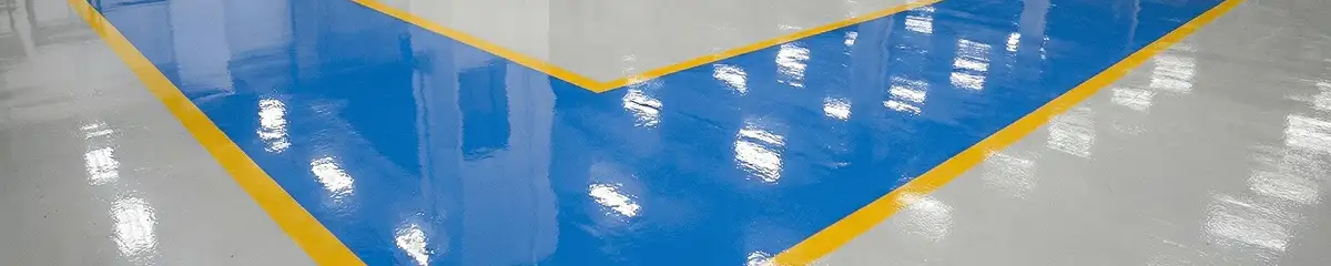 A factory floor professionally covered and marked with epoxy flooring in Hialeah, FL