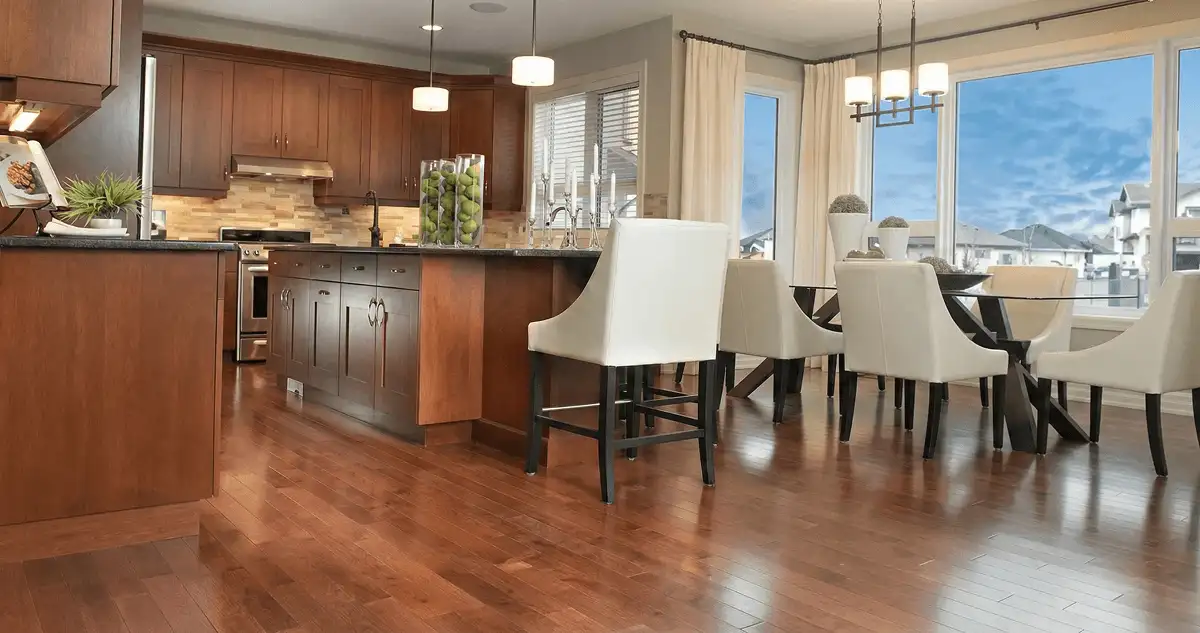 A modern kitchen with professionally installed wood flooring in Hialeah, FL