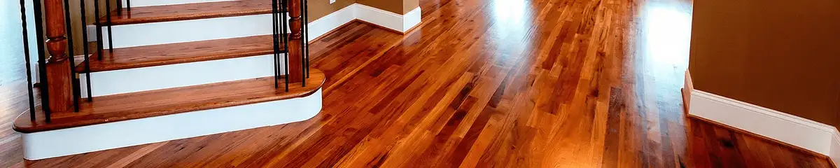 Base floor of a staircase with professionally restored wood flooring in Hialeah FL