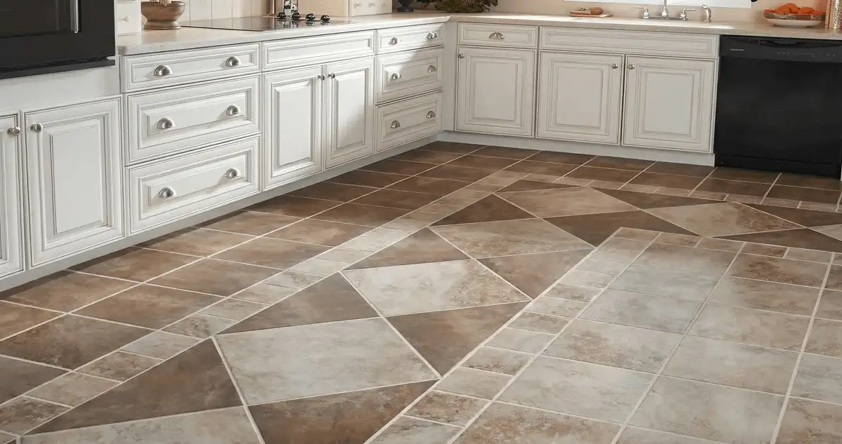 Kitchen with white cabinets and a professionally installed tile floor in Hialeah, FL