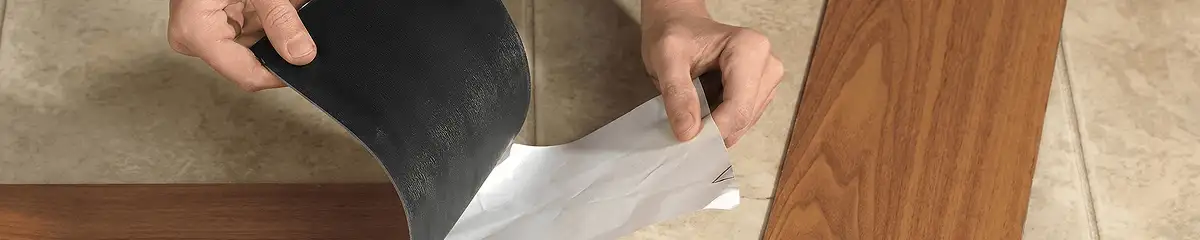 A professional installing vinyl flooring in Hialeah, FL